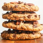 A close up picture of a stack of 4 Chocolate Chip Pecan Cookies.