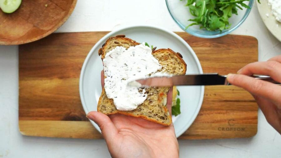 herb whipped feta on a slice of bread
