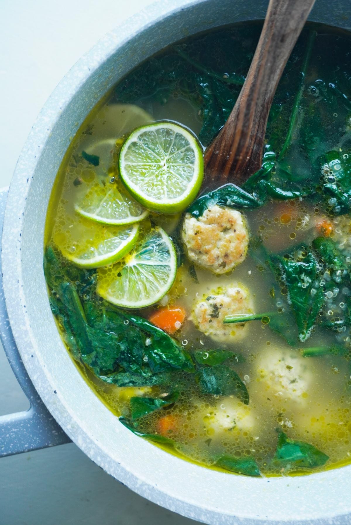 Healthy chicken quinoa soup in a pot