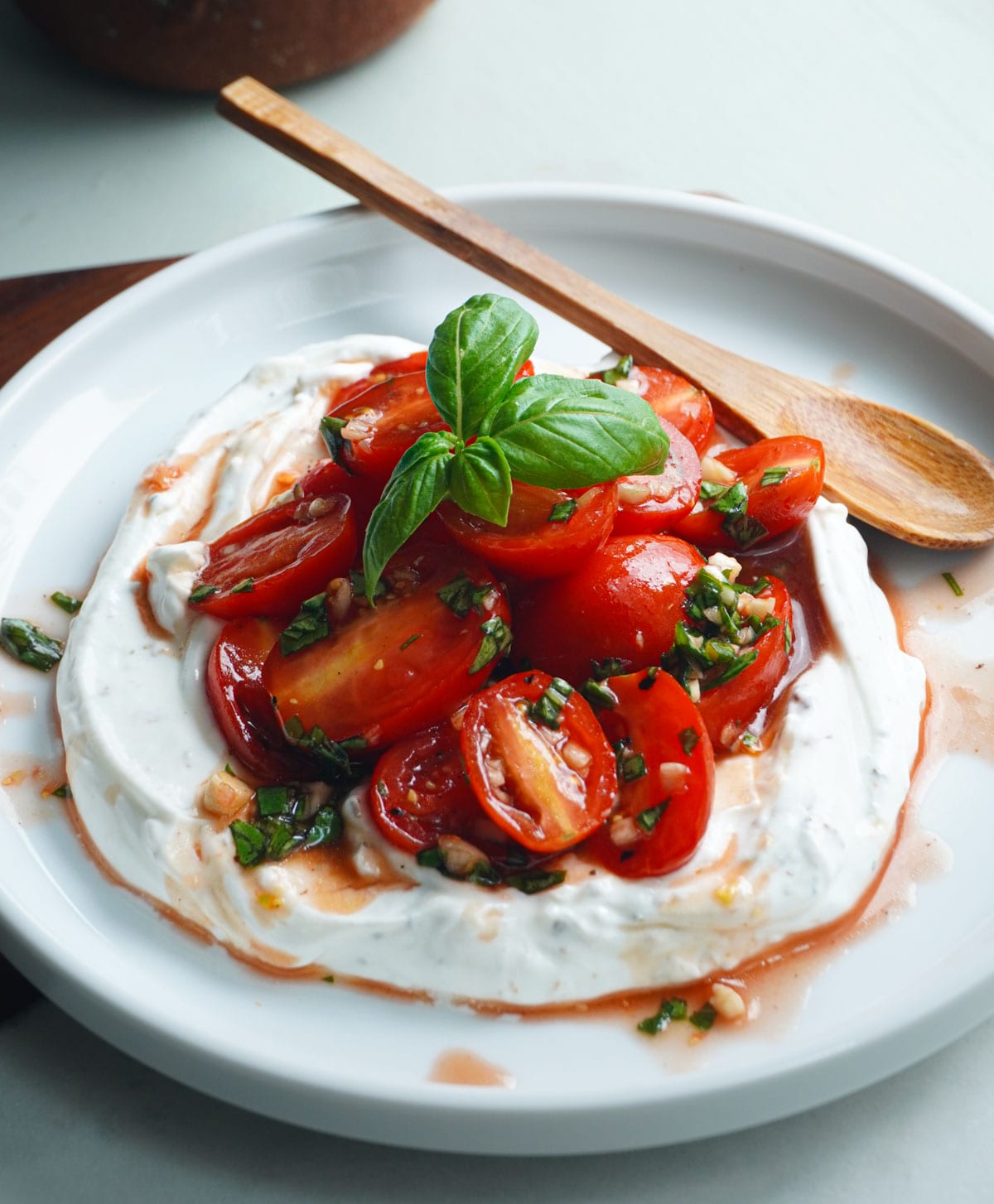 marinated tomatoes over greek yogurt recipe