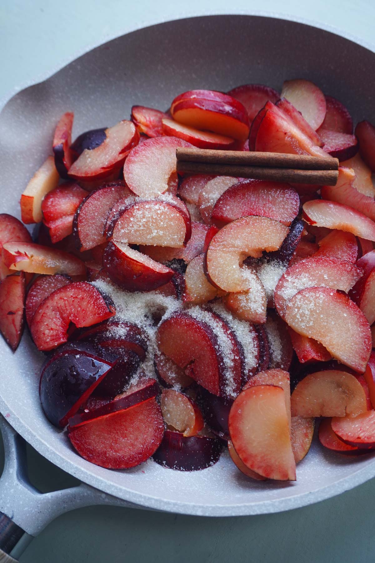 plums in a pan for galette dessert