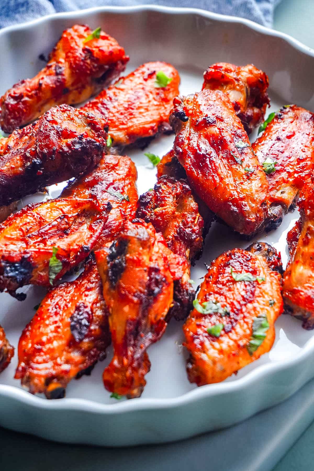 Harissa Wings on a white serving platter.
