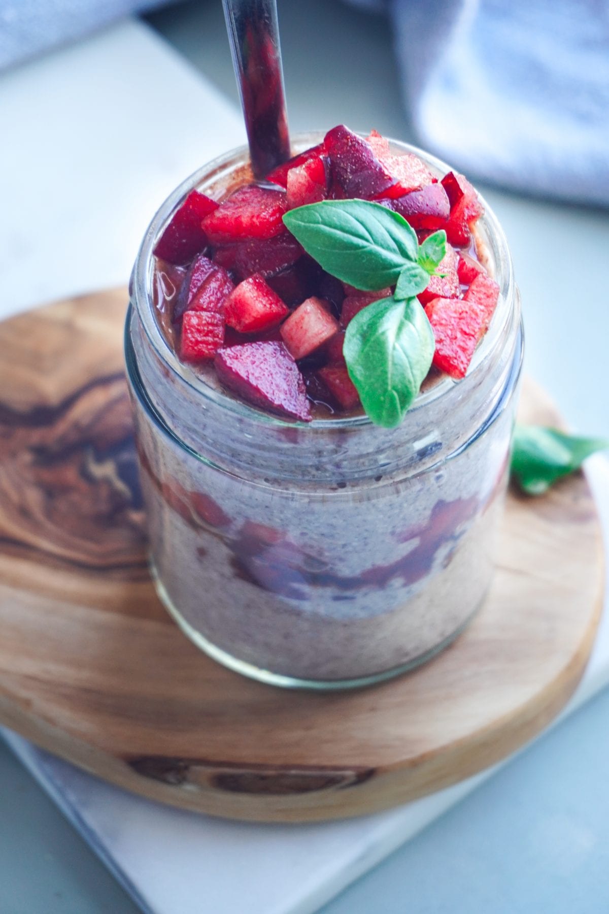 dairy free plum chia pudding with coconut milk in a jar
