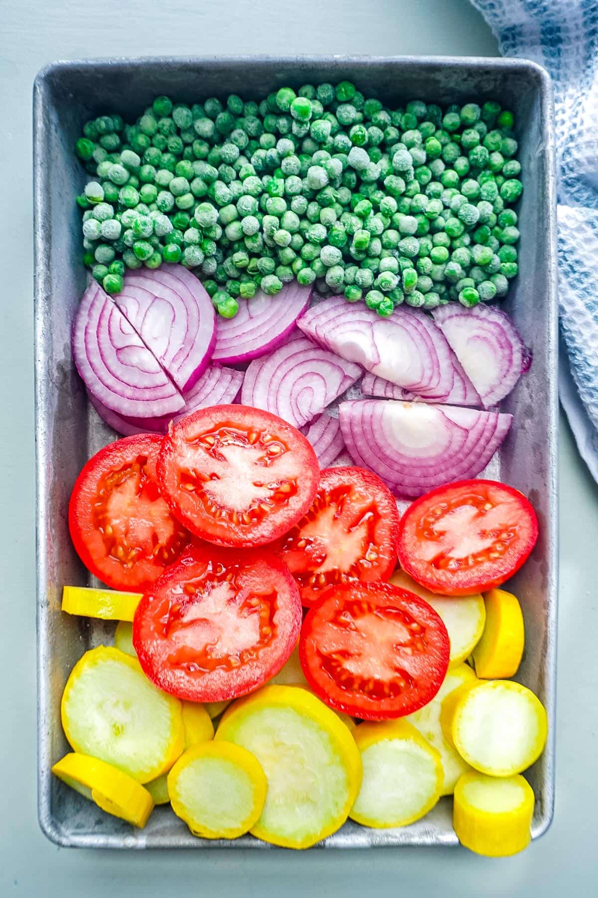An overhead picture of the vegetables for sheet pan chicken and vegetables.