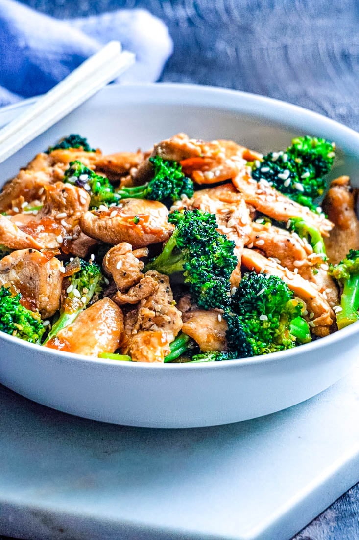 The finished Chinese Chicken and Broccoli in a white serving bowl.