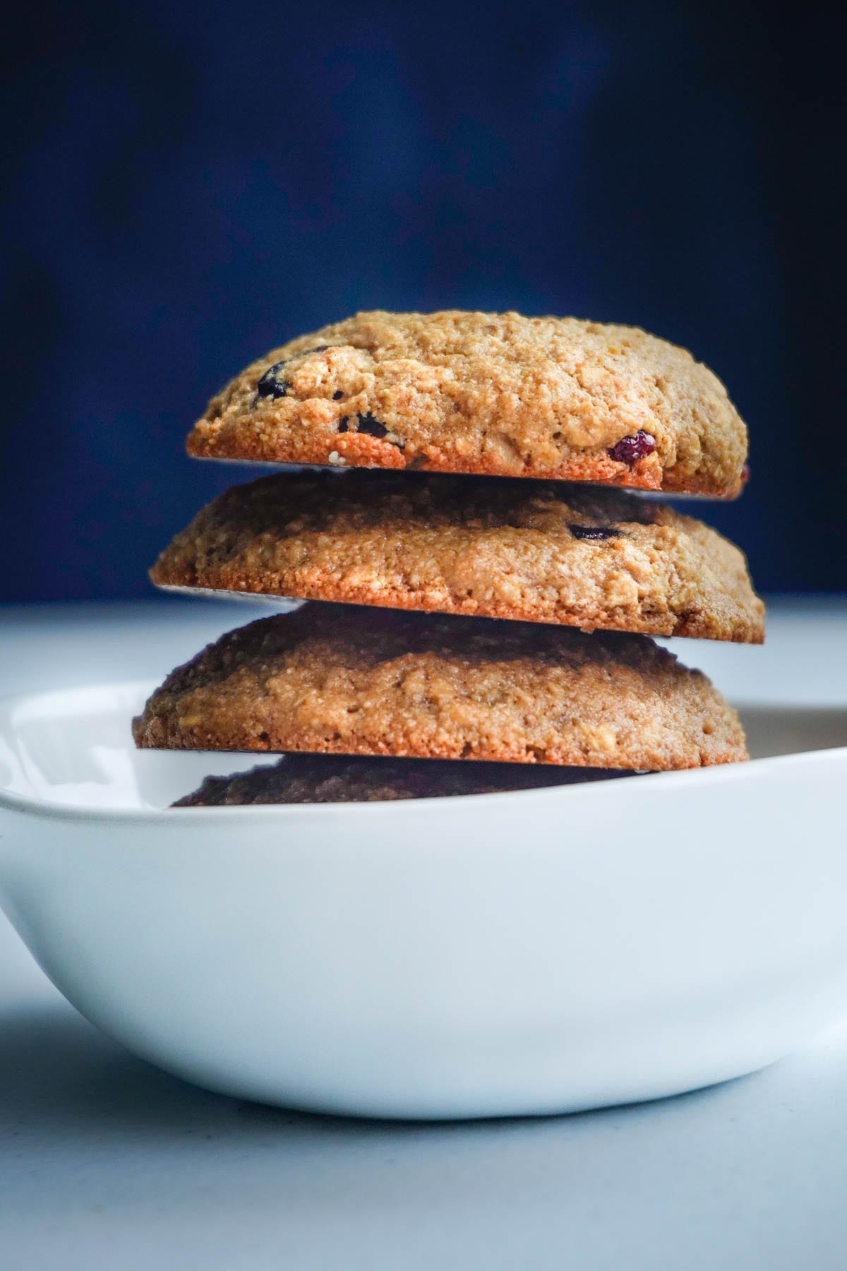 a stack of gluten free oatmeal cookies sweetened with maple syrup
