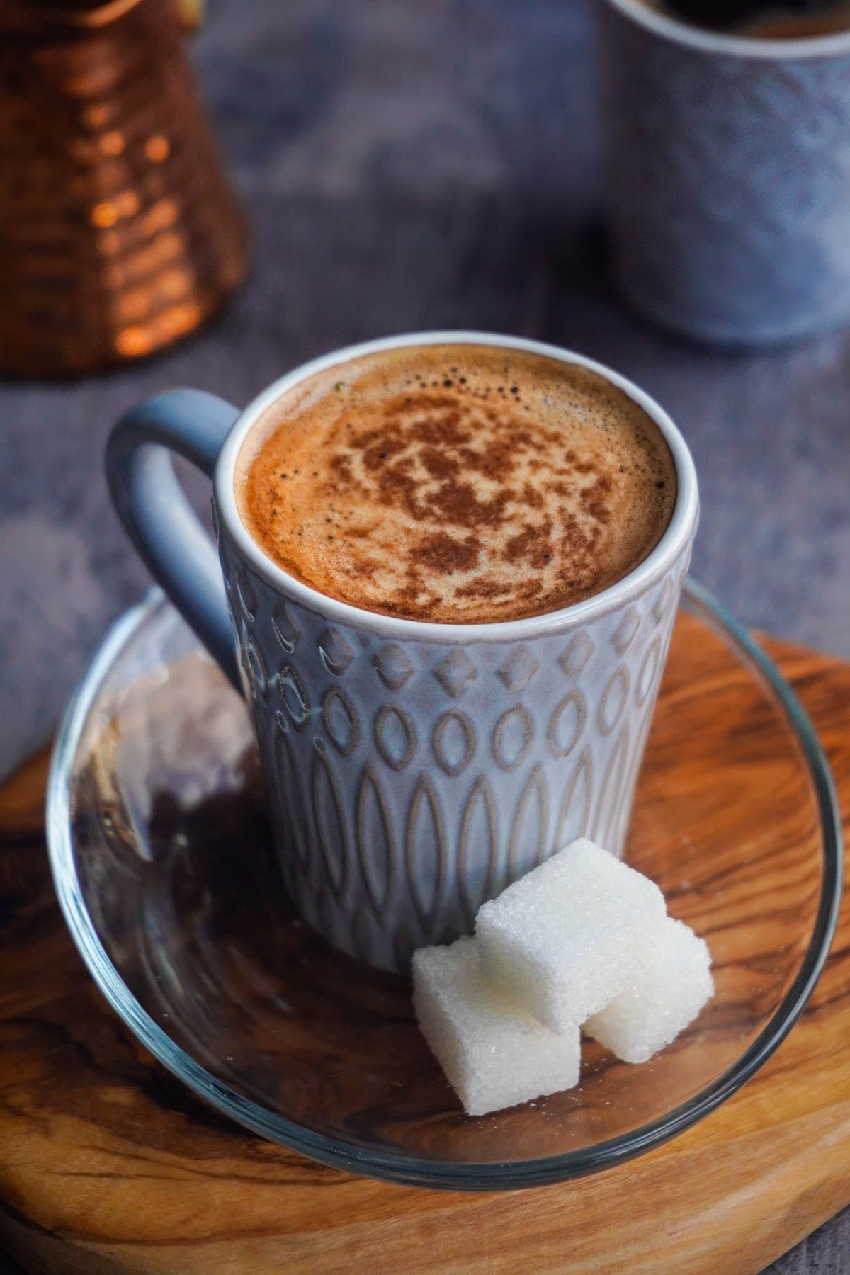 A cup of Turkish Coffee with sugar cubes