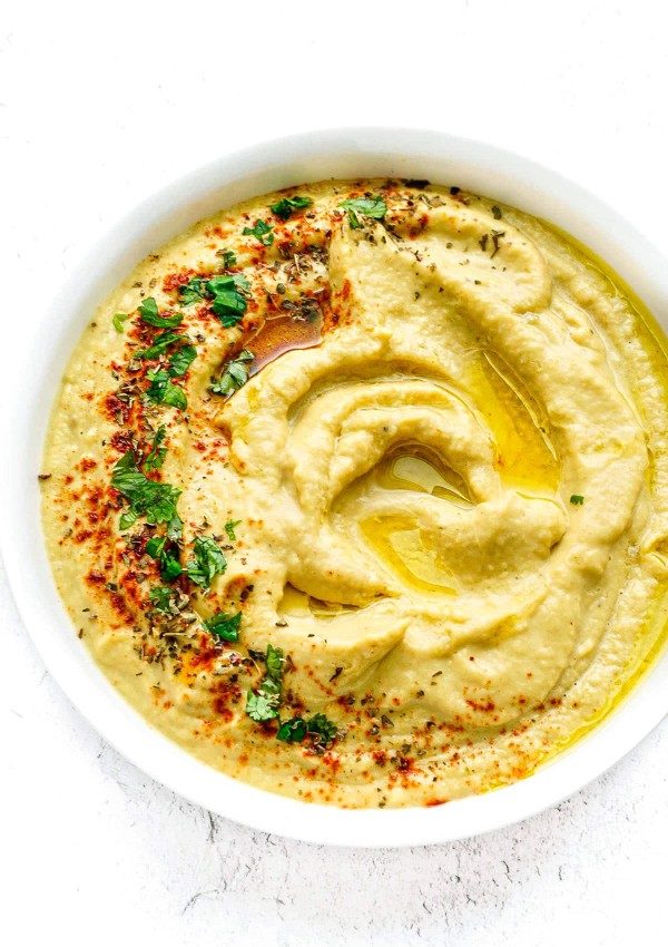 An overhead picture of a bowl full of Zucchini Hummus.
