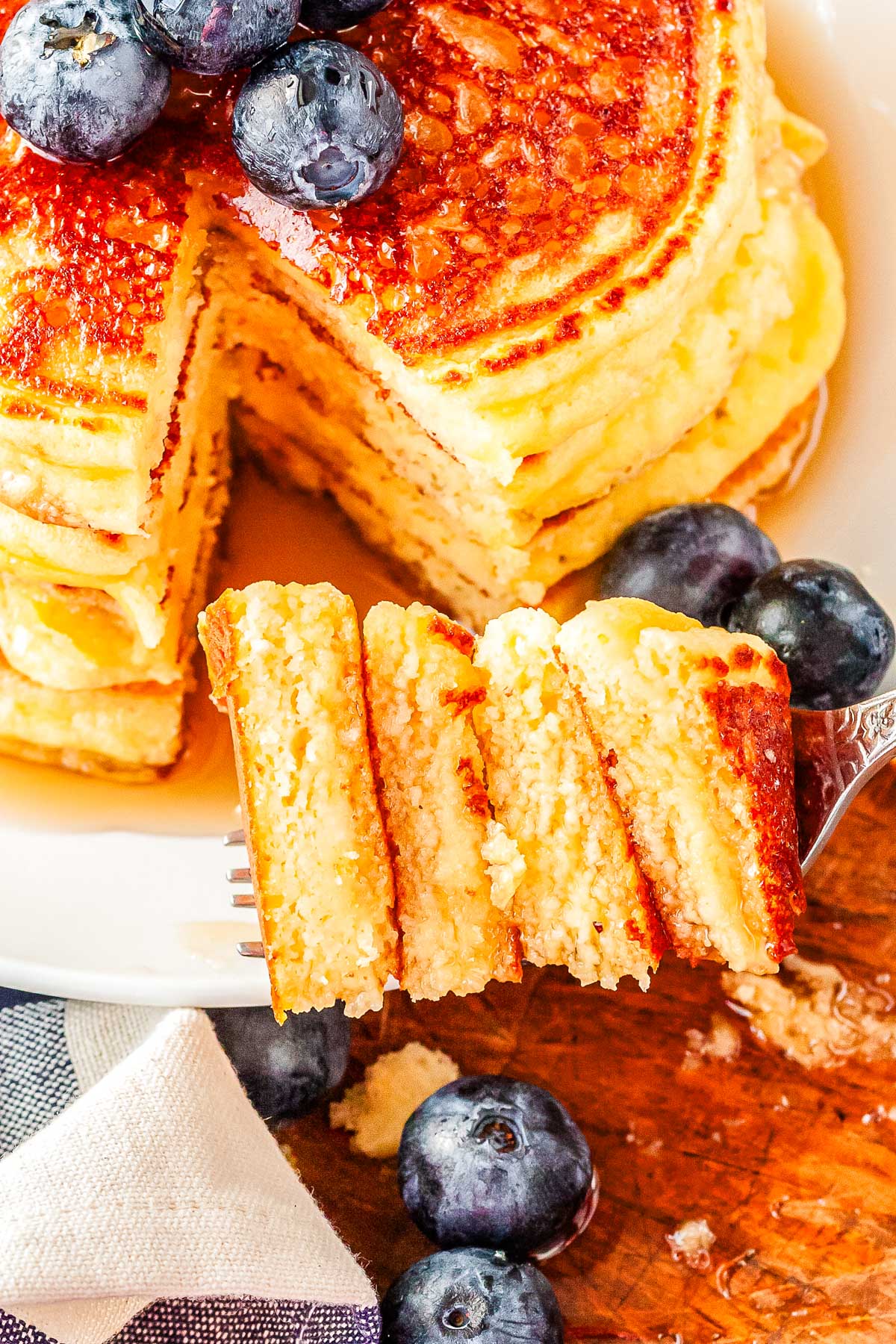Almond meal pancakes cut into so you can see the fluffy interior.