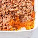 Dairy-Free Sweet Potato Casserole with crumble topping in a white baking dish.