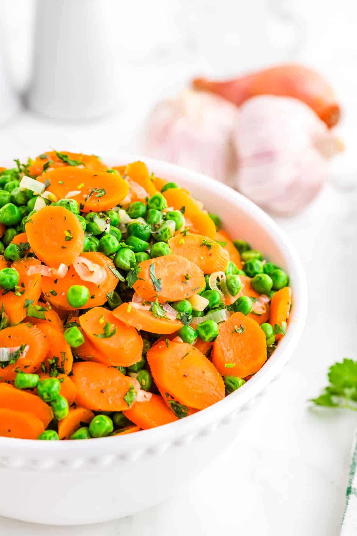 The finished Peas and Carrots in a serving bowl.