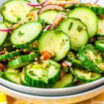 The finished Thai cucumber salad recipe in a white bowl.