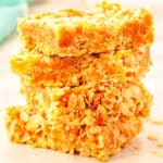 Four Vegan Rice Crispy Treats stacked on top of each other.