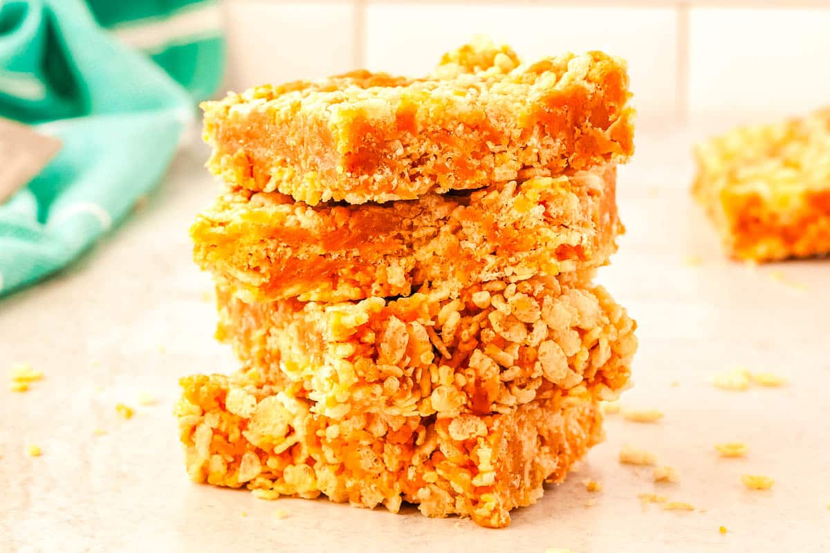 Four Vegan Rice Crispy Treats stacked on each other.