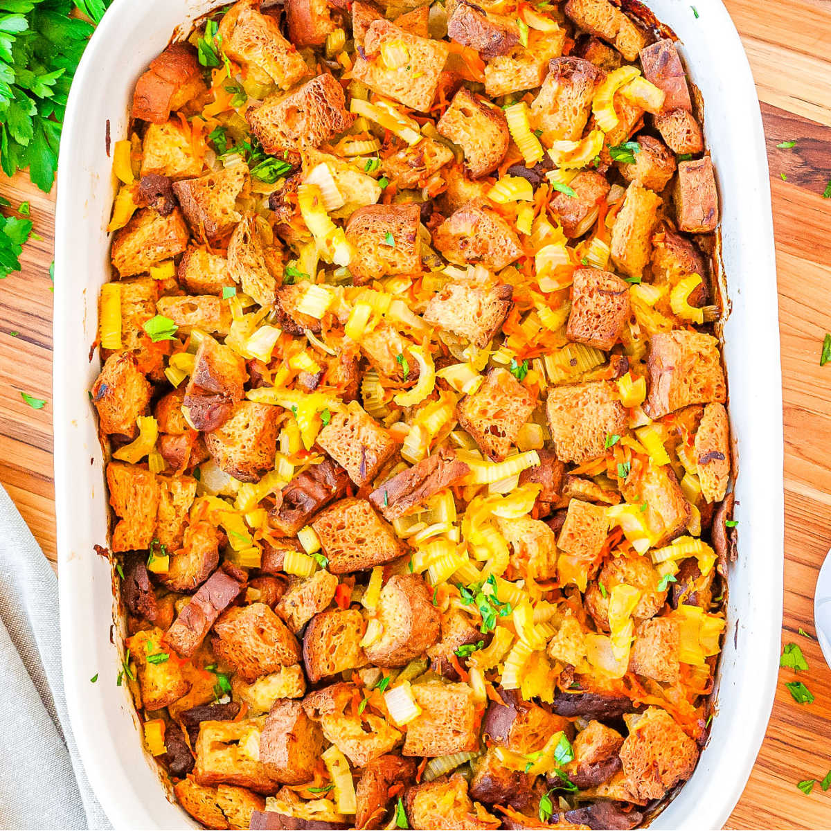 Stuffing in a white casserole dish.