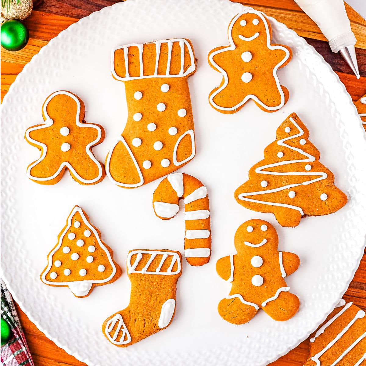 Eight cookies on a white serving platter.